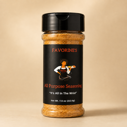 A bottle of FAVORINES All Purpose Seasoning with a black cap and black label, filled with a brown spice blend, set against a warm beige background.